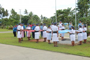 Police Officers readying to raise the flags of Samoa and the United Nations