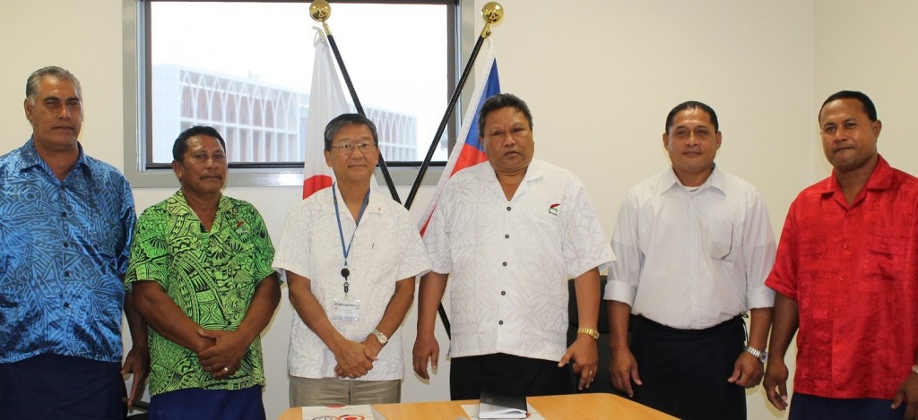 Japan's Ambassador to Samoa Tuimaugaoalii Kazumasa Shibuta, President of the Lotofaga Safata Primary School Committee Honorable Manualesagalala Enokati Posala (center) flanked by members of  the Lotofaga Safata Primary School Committee.