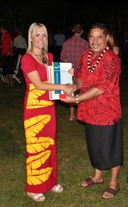 Minister Nikki Kaye hands over the NZ Building Code Standards to MWTI Associate Minister, Seiuli Ueligitone Seiuli